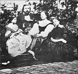 Teophile Gautier, his wife Ernesta Grisi-Gautier, daughters Estelle and Jutith. Near 1857.